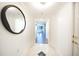 Bright hallway featuring marble floors, a stylish mirror, and views into the living space at 75 14Th Ne St # 3820, Atlanta, GA 30309