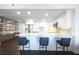 Open-concept kitchen with marble countertops and a breakfast bar perfect for casual dining at 75 14Th Ne St # 3820, Atlanta, GA 30309
