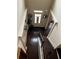 A welcoming foyer with a wooden door and decor, wooden stair case, and a stylish entryway showcasing a glimpse of the home's interior at 3740 Tupelo Trl, Auburn, GA 30011