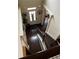 A welcoming foyer with a wooden door and decor, wooden stair case, and a stylish entryway showcasing a glimpse of the home's interior at 3740 Tupelo Trl, Auburn, GA 30011