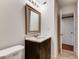 Updated bathroom features a vanity with marble countertop and modern fixtures at 2930 Torreya Se Way, Marietta, GA 30067