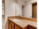 Bathroom with granite countertop vanity, large mirror and tiled shower, offering ample space at 2930 Torreya Se Way, Marietta, GA 30067