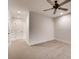 Neutral bedroom features carpeted floors, ceiling fan, recessed lights and a white door leading to hallway at 2930 Torreya Se Way, Marietta, GA 30067