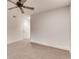 Carpeted bedroom with ceiling fan and neutral paint at 2930 Torreya Se Way, Marietta, GA 30067