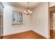 Dining area with chandelier and plantation shutters offers ample natural light at 2930 Torreya Se Way, Marietta, GA 30067