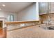 Modern stainless steel sink overlooking the living area through a pass through at 2930 Torreya Se Way, Marietta, GA 30067