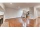 Open-concept living room that flows into kitchen with stainless appliances at 2930 Torreya Se Way, Marietta, GA 30067