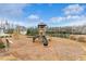 Community playground with slides, swings, and a soft landing surface for safety and fun at 5255 Austrian Pine Ct, Cumming, GA 30040