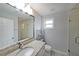 Bathroom featuring a single sink vanity, tiled floors and a tiled shower at 1322 Lorenzo Sw Dr, Atlanta, GA 30310