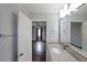 Bathroom featuring tile floors, granite vanity, and access to the bedroom at 1322 Lorenzo Sw Dr, Atlanta, GA 30310