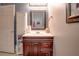 Bathroom with a dark wood vanity and built in storage shelves at 18 Commerce Row, Cartersville, GA 30121