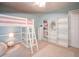 A childs bedroom featuring bunk beds, white carpet and ample storage at 18 Commerce Row, Cartersville, GA 30121