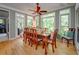 Elegant dining room filled with natural light and views of the lush backyard at 18 Commerce Row, Cartersville, GA 30121