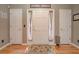 Bright foyer with hardwood floors, white doors, and neutral wall color at 18 Commerce Row, Cartersville, GA 30121