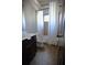 Bathroom includes a vanity, toilet, and shower/tub with shower curtain at 2313 Bouldercliff Way, Atlanta, GA 30316