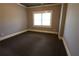 Neutral-toned room highlighting natural light and carpeted floor at 2313 Bouldercliff Way, Atlanta, GA 30316