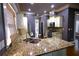 Kitchen with granite countertops and stainless steel appliances at 2313 Bouldercliff Way, Atlanta, GA 30316