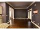 Large living room features hardwood floors and french doors at 2313 Bouldercliff Way, Atlanta, GA 30316