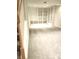 View of finished basement with carpet and white built in shelves and cabinets at 2691 Jamerson Rd, Marietta, GA 30066
