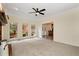 Bright living room featuring large windows, neutral paint, and a ceiling fan at 2691 Jamerson Rd, Marietta, GA 30066