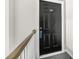 Close up view of an apartment door with unit number on a gray carpeted hallway at 3100 Parc Lorraine, Lithonia, GA 30038
