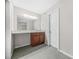 Bright bathroom with vanity, large mirror, ample lighting and storage for a functional and stylish space at 3100 Parc Lorraine, Lithonia, GA 30038
