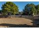 Expansive backyard features lush green trees and a wooden fence at 4270 Holliday Rd, Atlanta, GA 30349