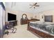 Spacious main bedroom features a tray ceiling, and carpet flooring at 4270 Holliday Rd, Atlanta, GA 30349
