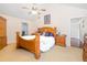Cozy bedroom with carpet flooring, a full size bed, and natural light at 4270 Holliday Rd, Atlanta, GA 30349
