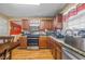 Functional kitchen featuring stainless steel appliances and granite countertops at 4270 Holliday Rd, Atlanta, GA 30349