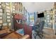 Dedicated office space with hardwood floors, a large desk, and a comfortable leather sofa at 4270 Holliday Rd, Atlanta, GA 30349