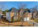 Two-story brick home with a well-manicured lawn and a two-car garage at 4270 Holliday Rd, Atlanta, GA 30349