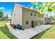 Spacious backyard featuring a concrete patio and access to the house at 868 Still Hill Ln, Lawrenceville, GA 30045