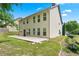 View of the home's backyard and concrete patio, great for entertaining at 868 Still Hill Ln, Lawrenceville, GA 30045