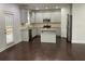 Spacious eat-in kitchen has stainless appliances, island and granite counters at 868 Still Hill Ln, Lawrenceville, GA 30045