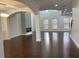 Open-concept living space features hardwood floors, fireplace and ample natural light at 868 Still Hill Ln, Lawrenceville, GA 30045