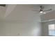 Bedroom featuring a trey ceiling with crown molding and a ceiling fan at 868 Still Hill Ln, Lawrenceville, GA 30045