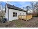 Home exterior showcasing a backyard with a wooden deck, ideal for outdoor relaxation at 139 Dahlia Nw Ave, Atlanta, GA 30314