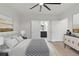 Serene bedroom with neutral tones, a large bed, and an en-suite bathroom entrance at 139 Dahlia Nw Ave, Atlanta, GA 30314