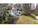 Charming home featuring a red front door, bay window, and a lush green lawn at 2836 Alpine Ne Rd, Atlanta, GA 30305