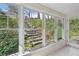 Bright sunroom with large windows overlooking the backyard at 2836 Alpine Ne Rd, Atlanta, GA 30305