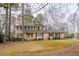 Charming two-story brick home featuring classic black shutters and mature trees in a well-established neighborhood at 1958 Starfire Ne Dr, Atlanta, GA 30345