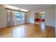 Spacious living room featuring gleaming hardwood floors, large windows and detailed trim work at 1958 Starfire Ne Dr, Atlanta, GA 30345