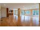 Open floor plan with hardwood floors and large windows for natural light and nature views at 1958 Starfire Ne Dr, Atlanta, GA 30345