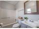 Bathroom featuring a vanity, toilet, and tub/shower combination at 2102 Lenoa Ln, Austell, GA 30106