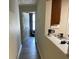 Hallway that leads to the studio apartment and to the kitchen at 5301 Fairington Club Dr, Lithonia, GA 30038