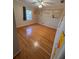 Bedroom with hardwood flooring, ceiling fan, window, and animal themed decorations at 6542 Cherry Tree Ln, Atlanta, GA 30328