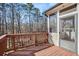 Enjoy the outdoors on this spacious wood deck overlooking a wooded lot at 11330 Easthaven Pl, Johns Creek, GA 30097