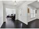 Inviting foyer with hardwood floors and views to the office room at 1406 Winston Pl, Decatur, GA 30033