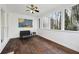 Cozy screened porch with wooden floors, ample light, and comfortable seating at 1406 Winston Pl, Decatur, GA 30033